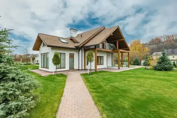 Residential home with covered porch and outdoor living space in Madison CT